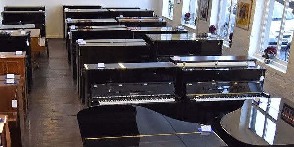 The Timeless Allure of Black Gloss Pianos 