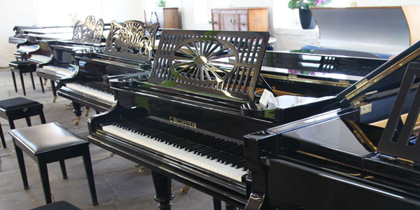 The Timeless Allure of Black Gloss Pianos 