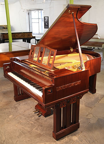  Arts and Crafts, 1916,  Ibach grand piano with a polished, mahogany case. Designed by Dutch Architect Pierre Joseph Hubert Cuypers, famous for designing the Rijksmuseum and Central Station in Amsterdam.