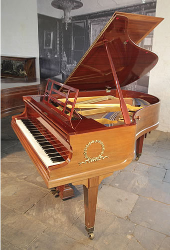A 1914, Bluthner Grand Piano For Sale with a Walnut Case and Open Work Music Desk. Cabinet Features Ormolu Decoration of Laurel Wreaths on Piano Cheeks