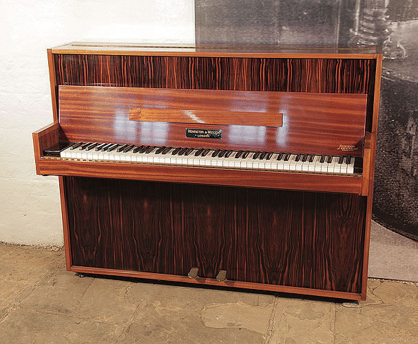 Mid Century Modern style, 1956, Monington and Weston upright piano for sale with a mahogany and macassar ebony case. Piano has an eighty-five note keyboard and two pedals. 