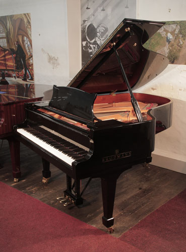 Reconditioned, 2014, Brodmann BG-187 grand piano for sale with a black case and spade legs. Piano has an eighty-eight note keyboard and a three-pedal lyre. .
