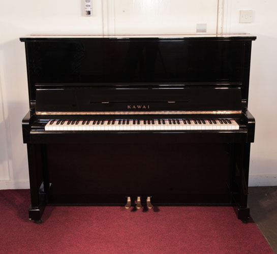 Piano for sale. Reconditioned, 1982, Kawai KS-2F Upright Piano For Sale with a Black Case and Brass Fittings. Piano has an eighty-eight note keyboard and three pedals. 