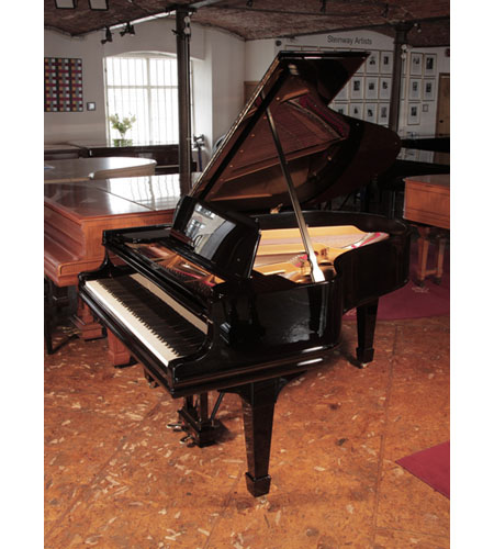 Rebuilt, 1910, Steinway Model O grand piano with a with a black case and brass fittings