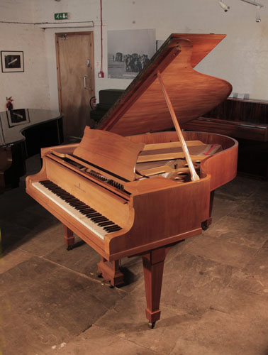 Reconditioned, 1932, Steinway Model O grand piano for sale with a satin, walnut case and spade legs. Piano has an eighty-eight note keyboard and a two-pedal lyre.   
