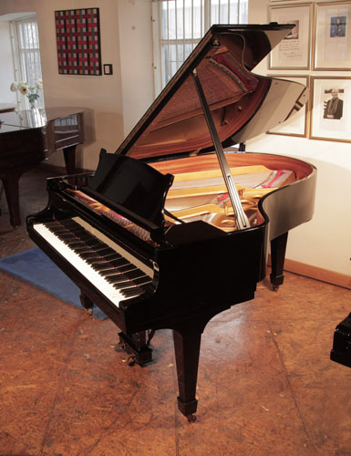 Rebuilt, 1975, Steinway Model O grand piano for sale with a black case and spade legs. Piano has an eighty-eight note keyboard and a two-pedal lyre.   