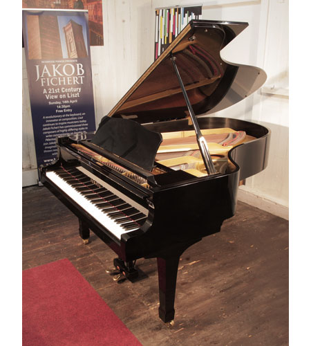 Reconditioned, 1984, Yamaha G5 grand piano for sale with a black case and spade legs. Piano has an eighty-eight note keyboard and a two-pedal lyre. 