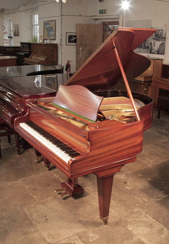Restored, 1933, Bechstein Model K baby grand piano with a polished, mahogany case and square, tapered legs