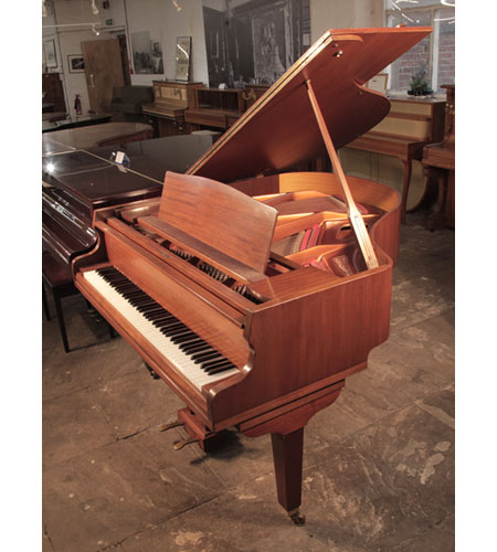 Reconditioned, 1975, Broadwood baby grand piano for sale with a mahogany case and square, tapered legs. Piano has an eighty-eight note keyboard and a two-pedal lyre