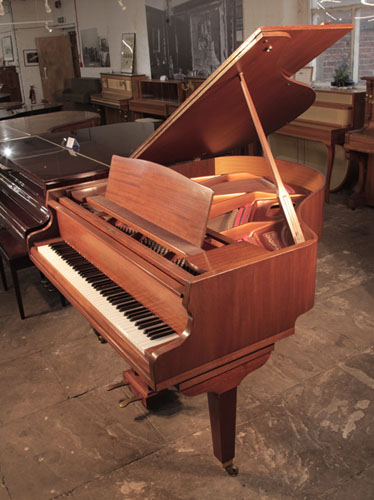 Reconditioned, 1975, Broadwood baby grand piano for sale with a mahogany case and square, tapered legs. Piano has an eighty-eight note keyboard and a two-pedal lyre