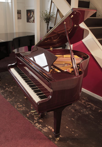 Reconditioned, 2007, Challen GP142 baby  grand piano for sale with a mahogany gloss case. Piano has an eighty-eight note keyboard and a three-pedal lyre.  