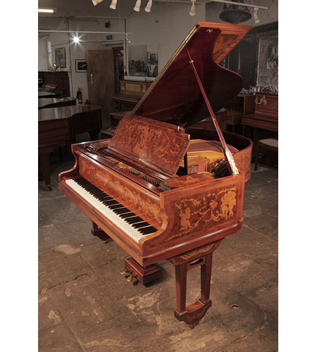 Restored, 1913, Lipp baby grand piano with a walnut case. Entire cabinet inlaid with cherubs, figures and neoclassical motifs. Piano has an eighy-eight note keyboard and two pedals.