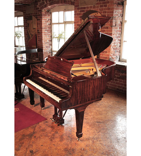 Reconditioned,  1975, Steinway Model A grand piano for sale with a  tiger mahogany case spade legs