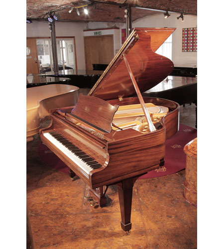 Rebuilt, 1937 Steinway Model S baby grand piano with a crown cut mahogany case and spade legs 