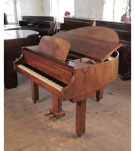  Art Deco style Strohmenger baby grand piano with a walnut case 