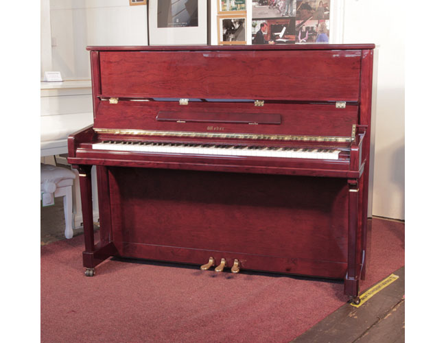 Reconditioned, 2010, Weber TU-122S upright piano for sale with a mahogany gloss case and brass fittings. Piano has an eighty-eight note keyboard and three pedals.  