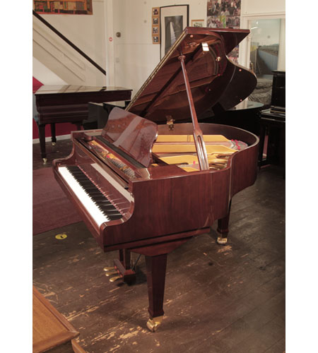 Reconditioned, 2008, Weber WLG-50 baby grand piano for sale with a walnut gloss case.  Piano has an eighty-eight note keyboard and a three-pedal lyre.