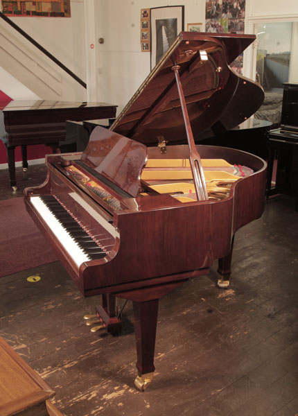 Reconditioned, 2008,   Weber WLG-50 baby  grand piano for sale with a walnut gloss case. Piano has an eighty-eight note keyboard and a three-pedal lyre.  