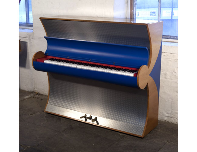 Art Deco Style, 2000, Besbrode upright piano specially commissioned for the Frankfurt Fair 2000. Piano uniquely finished with aluminium and leather.