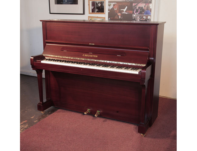 Reconditioned, 1986, Bechstein model 11 upright piano with a satin mahogany case and brass fittings