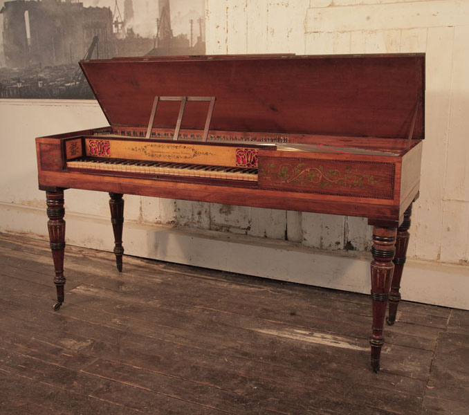 A 1780's Broadwood square piano with an inlaid mahogany case, with openwork panels and turned legs. Entire cabinet hand-painted in Neoclassical motifs. Piano has an seventy-eight note keyboard.