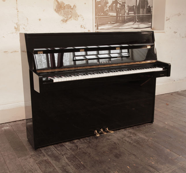 Reconditioned 1997, Eterna ER-C10 upright piano in black gloss. Made by Yamaha. 