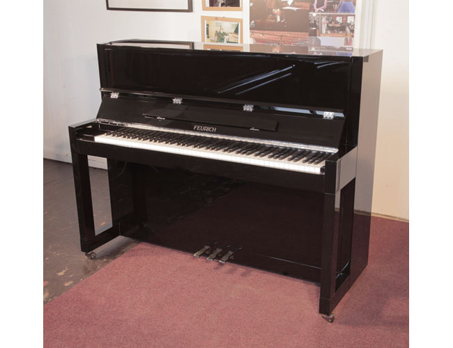 Reconditioned, 2013, Feurich Model 115 Premiere upright piano with a black gloss case in Bauhaus style.