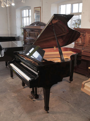  Reconditioned, 1985, Kawai GS-30 grand piano for sale with a black gloss case and spade legs. Piano has an eighty-eight note keyboard and a three-pedal lyre.