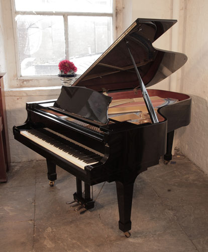 Reconditioned, 1981, Kawai KG-5D grand piano for sale with a black gloss case and spade legs. Piano has an eighty-eight note keyboard and a three-pedal lyre
