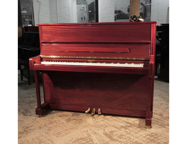 Reconditioned, 2013, Kemble K121CL upright piano in mahogany gloss with fitted Yamaha silent system. 