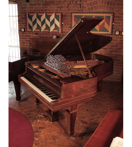 Restored, 1907, Steinway Model B grand piano for sale with a rosewood case, filigree music desk and spade legs . Piano has an eighty-eight note keyboard and a three-pedal lyre.  
