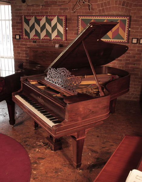 Restored, 1907, Steinway Model B grand piano for sale with a rosewood case, filigree music desk and spade legs Piano has an eighty-eight note keyboard and a three-pedal lyre