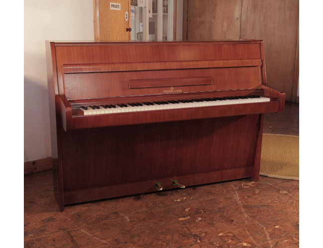Reconditioned, 1968, Steinway Model F upright piano for sale with a walnut case and brass fittings.