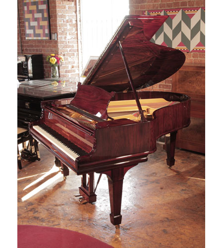Rebuilt, 1910, Steinway Model O grand piano for sale with a rosewood gloss case spade legs. Beautiful wood grain. Piano has an eighty-eight note keyboard and a two-pedal lyre.  