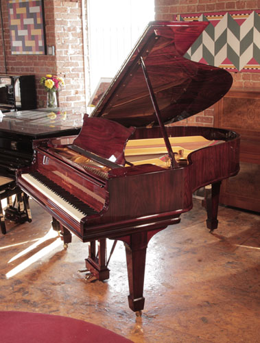 Rebuilt, 1910, Steinway Model O grand piano for sale with a rosewood gloss case spade legs. Beautiful wood grain. Piano has an eighty-eight note keyboard and a two-pedal lyre.  