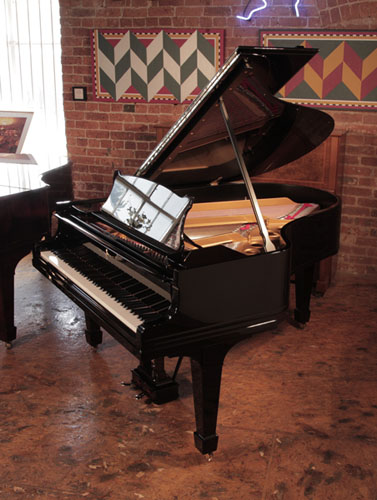 Rebuilt, 1921, Steinway Model O grand piano for sale with a black gloss case spade legs. Piano has an eighty-eight note keyboard and a two-pedal lyre.  