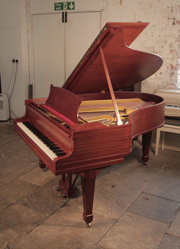 Reconditioned, 1927, Steinway Model O grand piano for sale with a figured, mahogany case and spade legs. Piano has an eighty-eight note keyboard and a two-pedal lyre.   