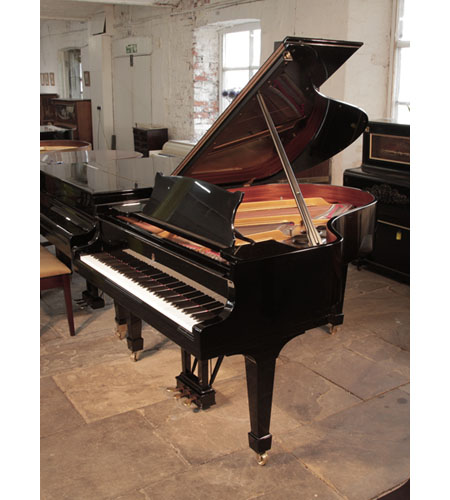 A 1986, Steinway Model O grand piano for sale with a black gloss case and spade legs.