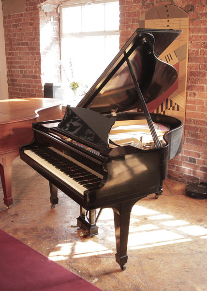 Reconditioned, 1925, Steinway Model S baby  grand piano for sale with a black  case and spade legs. Piano has an eighty-eight note keyboard and a two-pedal lyre.