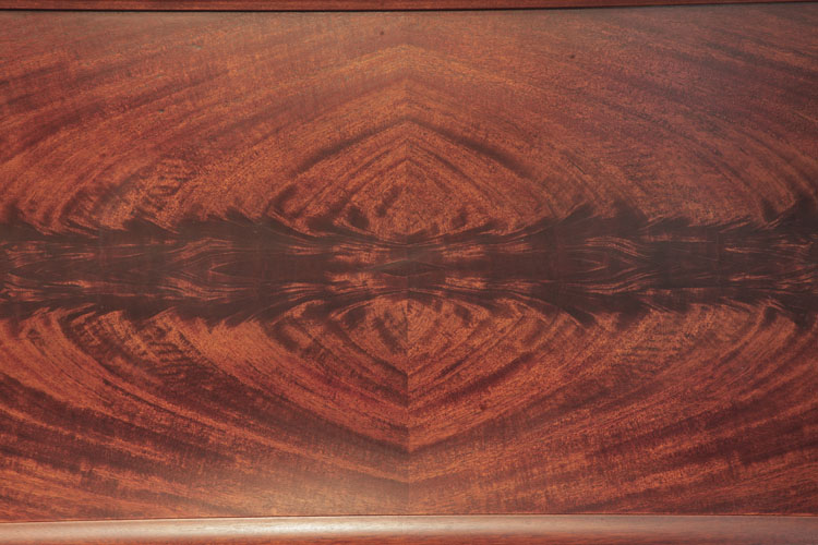 Front panel featuring book-matched flame mahogany