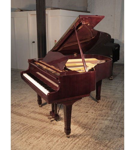  Reconditioned, 1972, Yamaha G2 grand piano for sale with a mahogany, gloss case and spade legs. Piano has an eighty-eight note keyboard and a two-pedal lyre. 